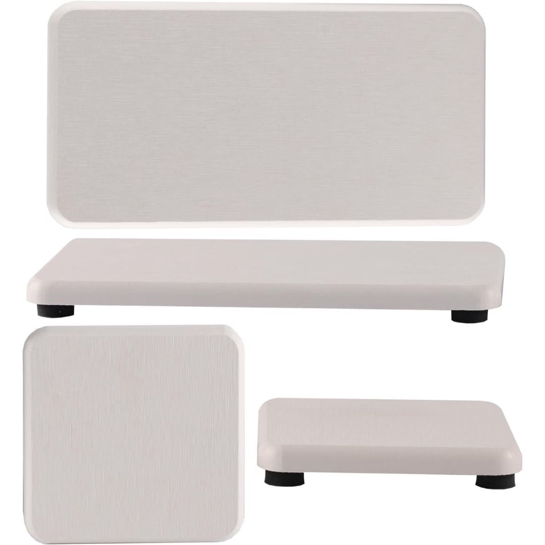 A set of four water absorbing drying trays on a white background