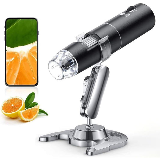 A black and silver wireless digital microscope with a stand, shown on a white background with a smartphone displaying a citrus fruit image and sliced oranges with green leaves as props.
