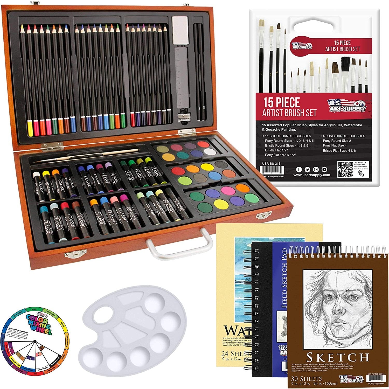 A 102 piece art drawing set in a wooden case with all the inclusions laid out.