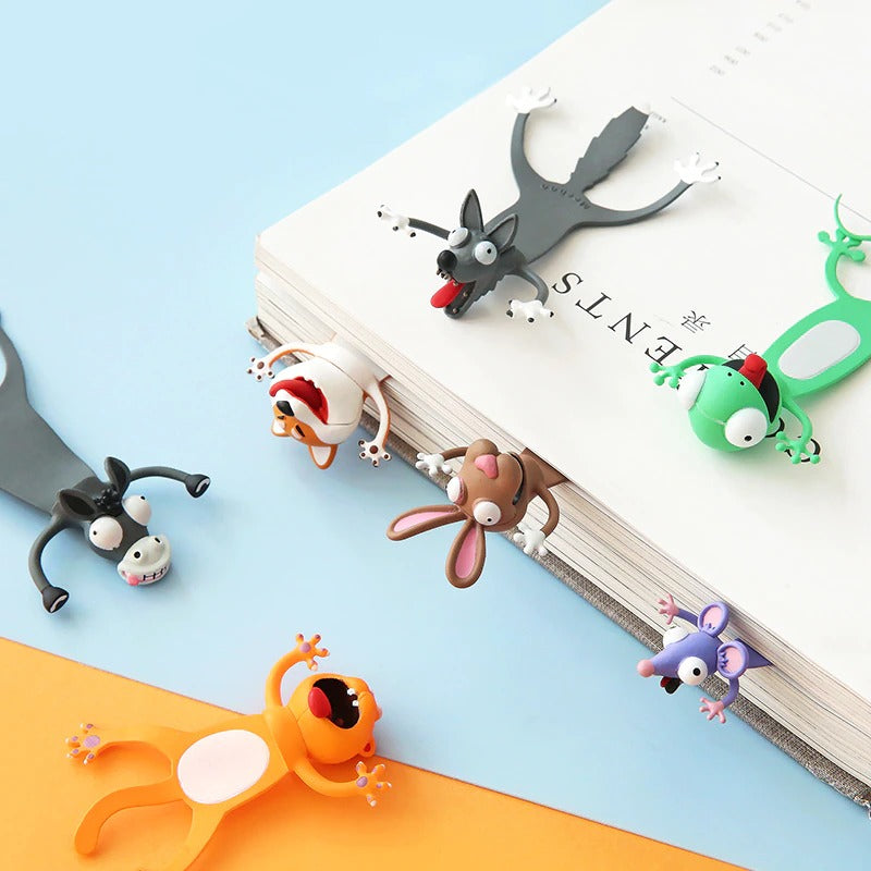 Seven variations of 3D cartoon bookmarks. Some are inside the pages of a book while the others are displayed in full length to be able to see how they look.