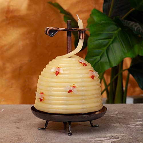 All natural beehive candle in daylight on a table