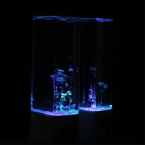 Illuminated dancing water fountain speakers