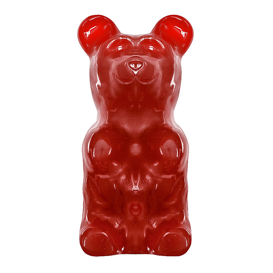 Enormous glossy red five-pound gummy bear standing upright against a white background