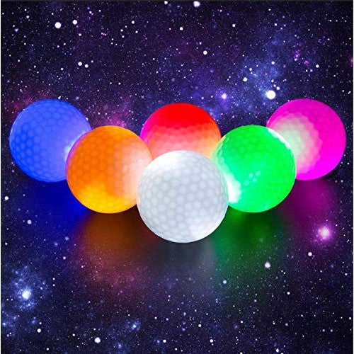 Set of colorful illuminated golf balls designed for evening golf