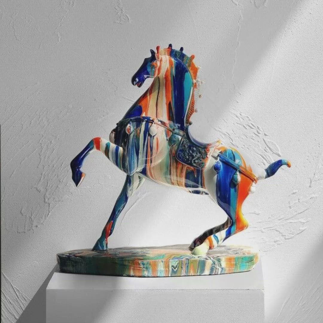 A video which features a collage of multiple images of a decorative horse which looks like it is dripping with different colored paints. Their is upbeat, happy music playing.