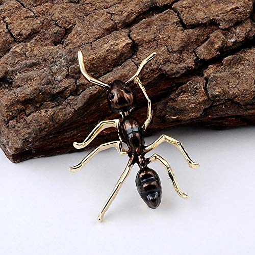 Gold and brown ant shown climbing up a log