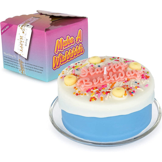 A candle which is shaped and looks like a blue happy birthday cake with white frosting. It also comes with its own blue and purple gift box.