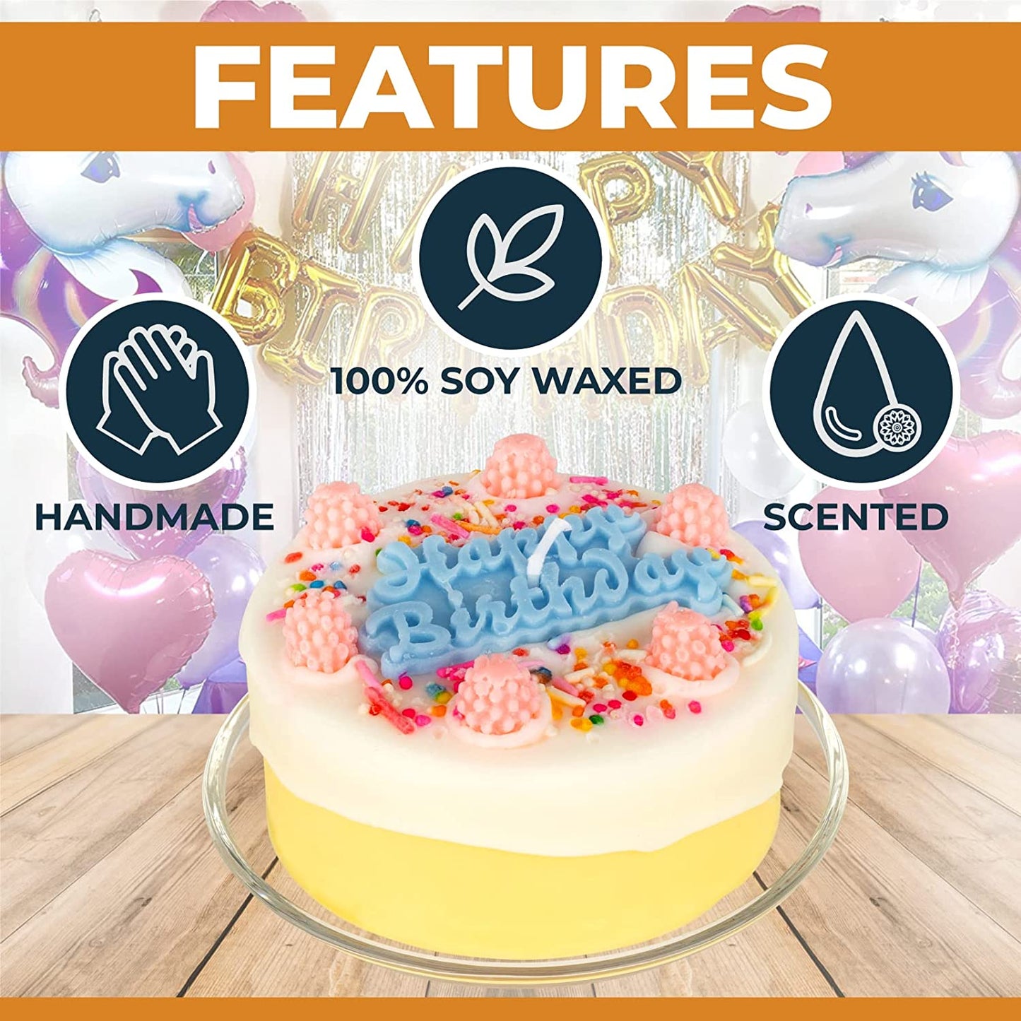A candle shaped like a birthday cake with happy birthday written on the top of it. Also features text which says, handmade, 100% soy waxed and scented.