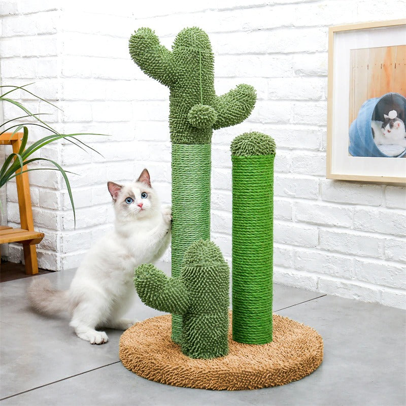 A ragdoll kitten has its claws in a cactus shaped scratching pole designed for cats