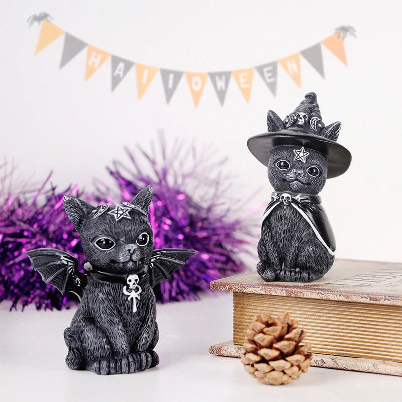Two black cat figures for indoors or outdoors. The two cats are dressed up like wizards.