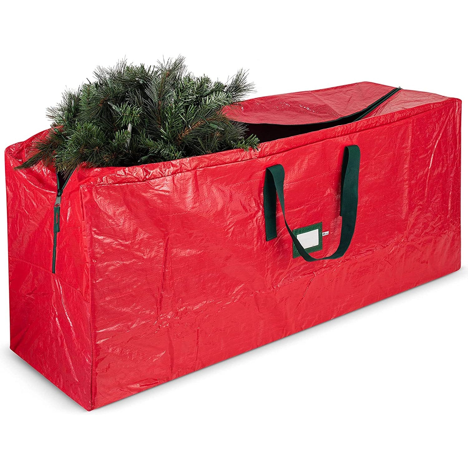 A large red Christmas tree storage bag with a green Christmas tree in the bag.