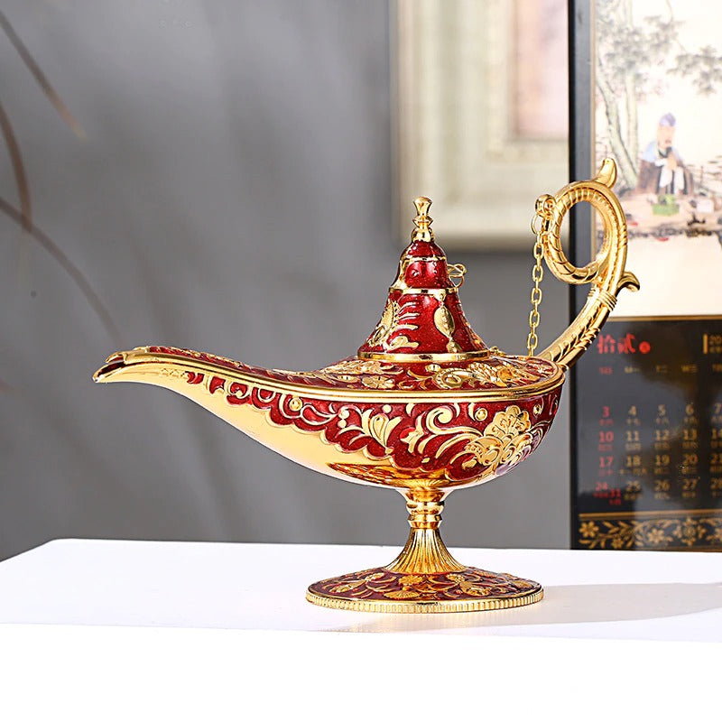 A decorative red and gold classic style magic genie lamp