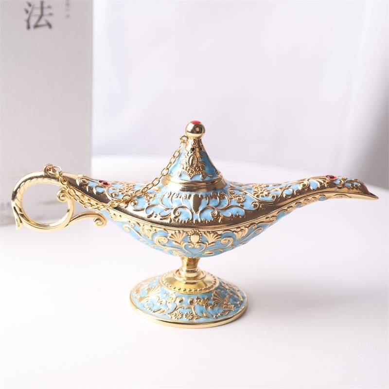A decorative sky-blue and gold colored Aladdin-style magic genie lamp