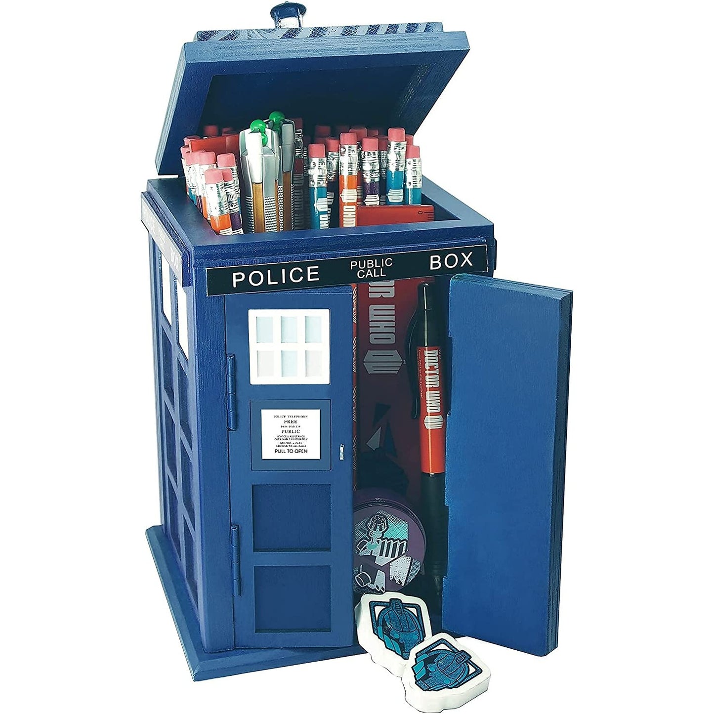 A storage container which is shaped like the Tardis from the TV show Doctor Who. There are a number of pencils and other stationary items inside the Tardis.