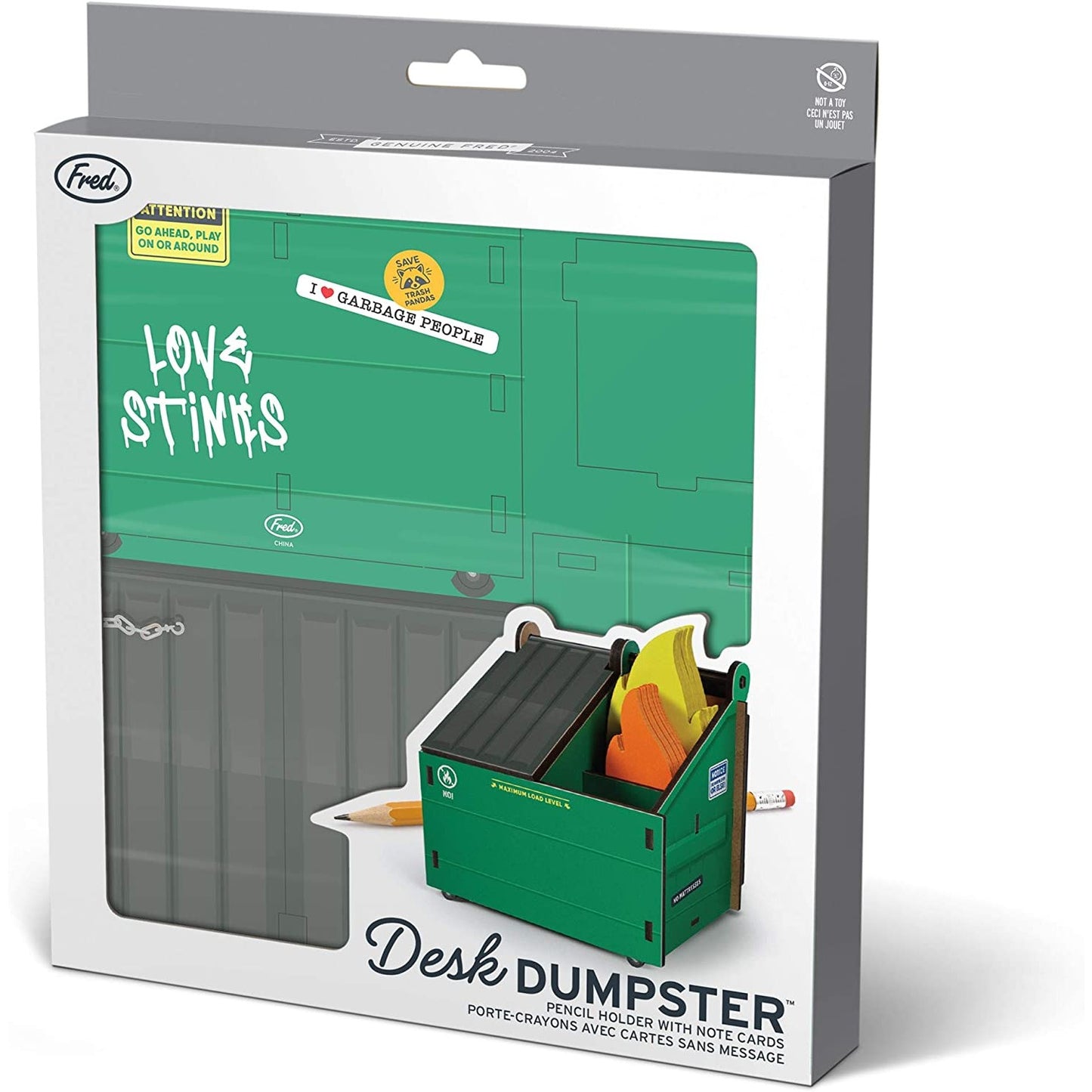 The packaging of a dumpster fire desk caddy designed by Genuine Fred.