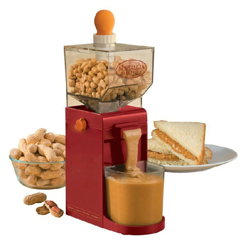 An electric peanut butter machine making fresh peanut butter into a jar under the spout. There is also a peanut butter sandwich and unshelled peanuts next to the machine. 