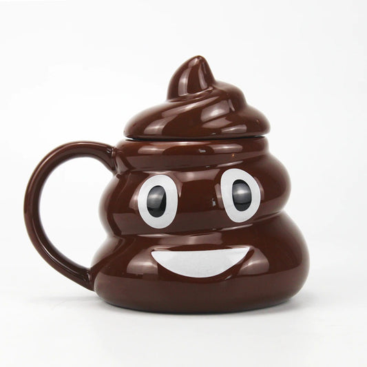 A brown coffee mug with a lid which is shaped like the poop emoji