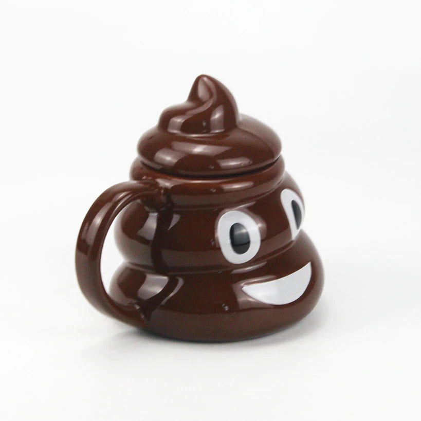 A side view of a brown coffee and tea mug with a lid which is shaped like the poop emoji