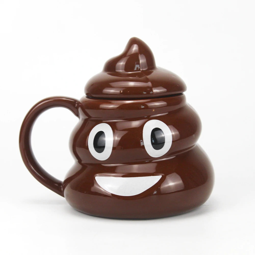 A brown coffee and tea cup with a lid which is shaped like the poop emoji