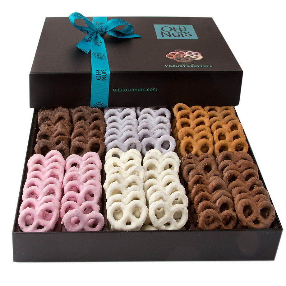Gift box of gourmet pretzels coated in assorted chocolate and colorful yogurt flavors with blue ribbon