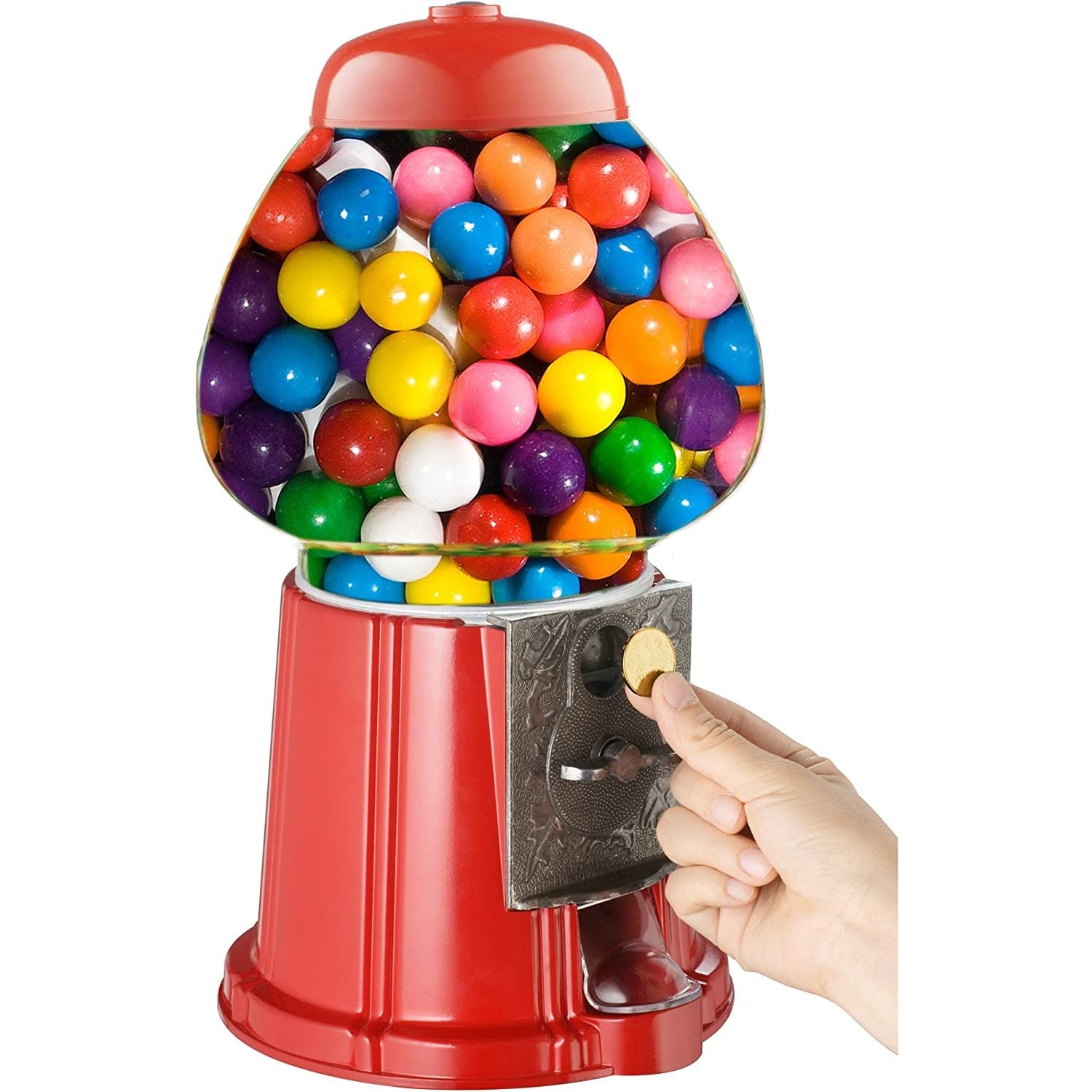A side view of a retro gumball dispenser filled with colorful gumballs. A hand is holding a coin near the coin slot.