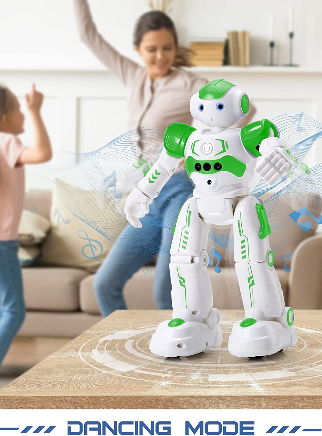 A green and white robot is dancing along with two kids. The text reads, 'dancing mode.'