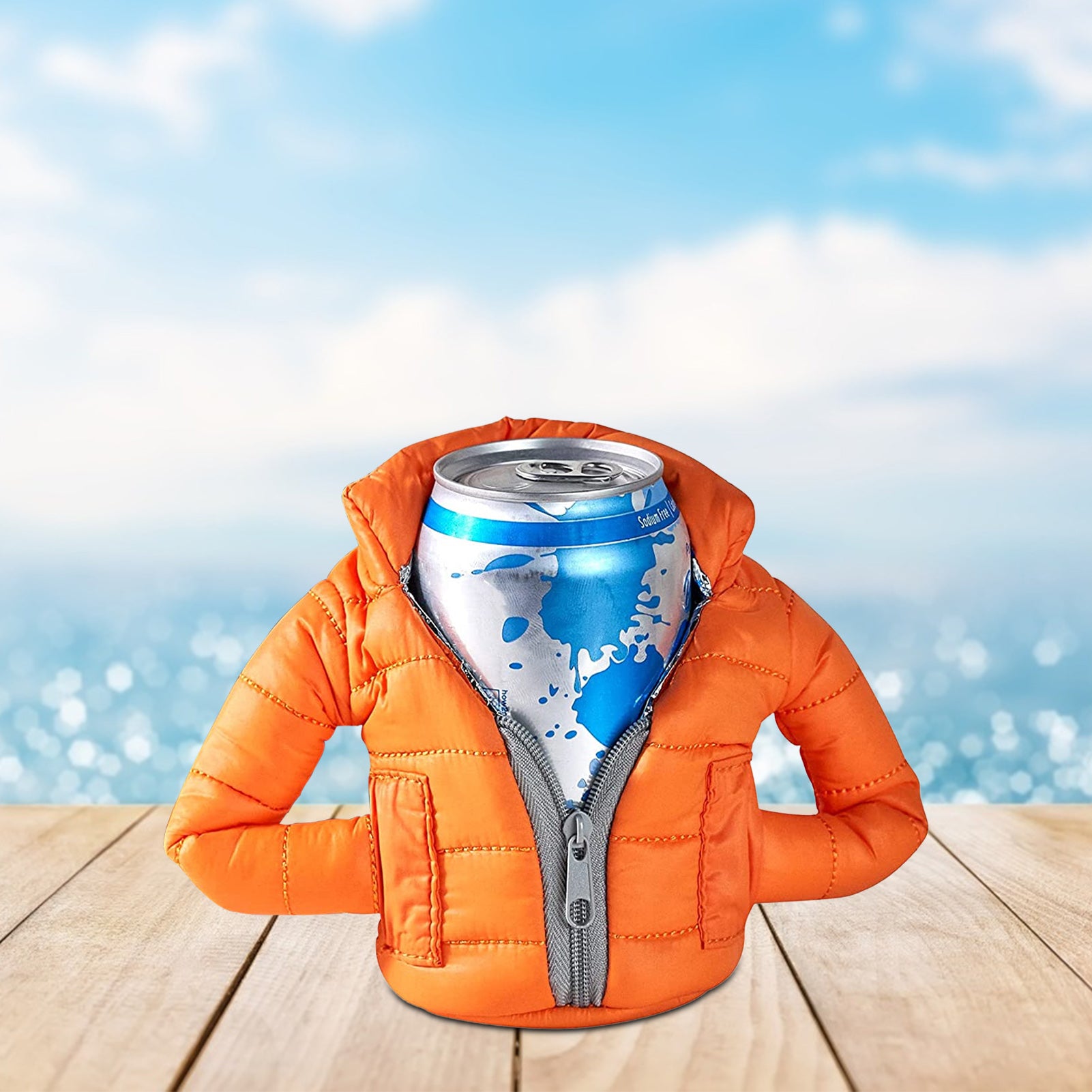 An orange insulated drink cooler designed to look identical to a miniature insulated jacket. There is a can of drink inside the can cooler jacket.