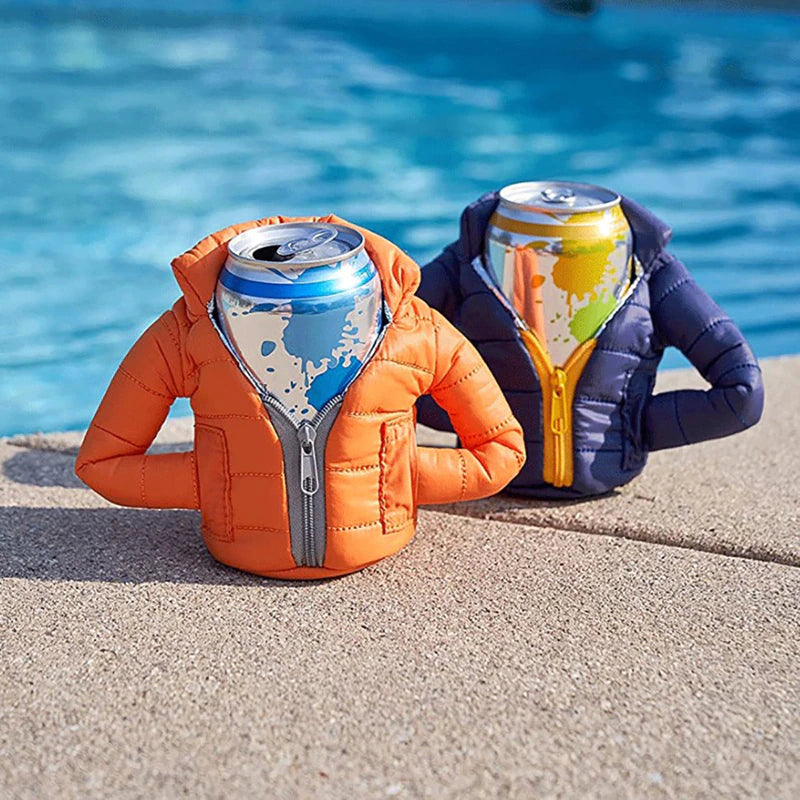 A blue and purple insulated beer can coolers which look like miniature insulated winter parkas. They each have a can inside them and are next to a swimming pool.