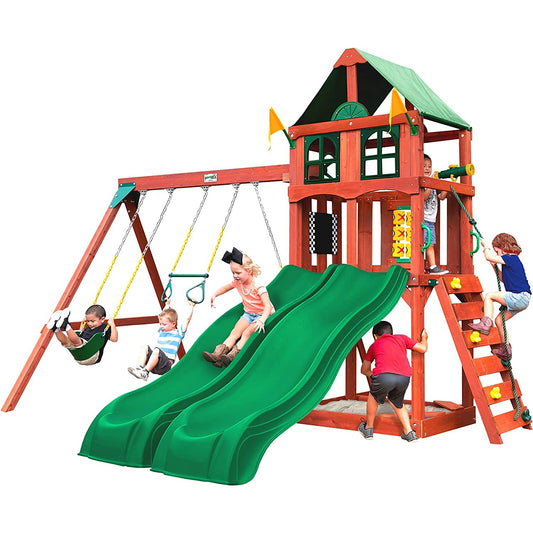A large wooden kids play-set with multiple kids playing on the various slides and swings.