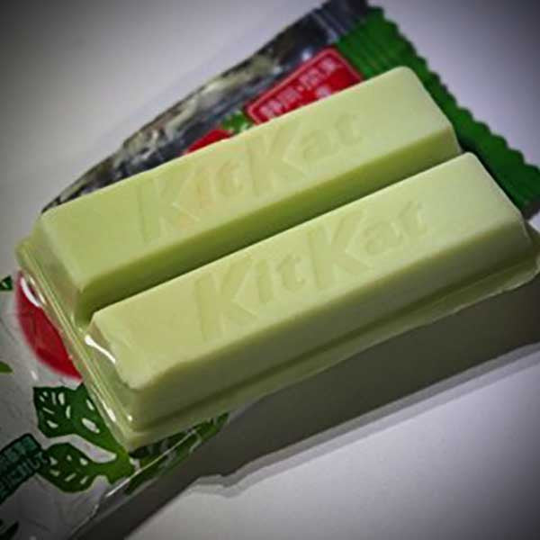 Pale green wasabi-flavored Kit Kat chocolate wafer fingers with Japanese packaging