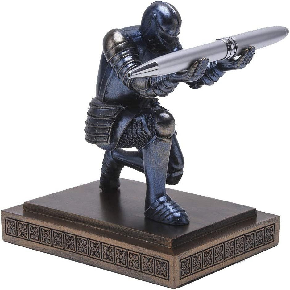 Armored medieval knight kneeling and presenting a pen on a decorative desk stand