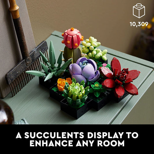 A Lego succulents building kit for adults on a green table.