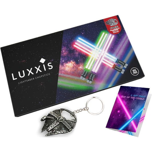  A boxed set of Star Wars LED lightsaber chopsticks with an instruction manual and a Millennium Falcon bottle opener.