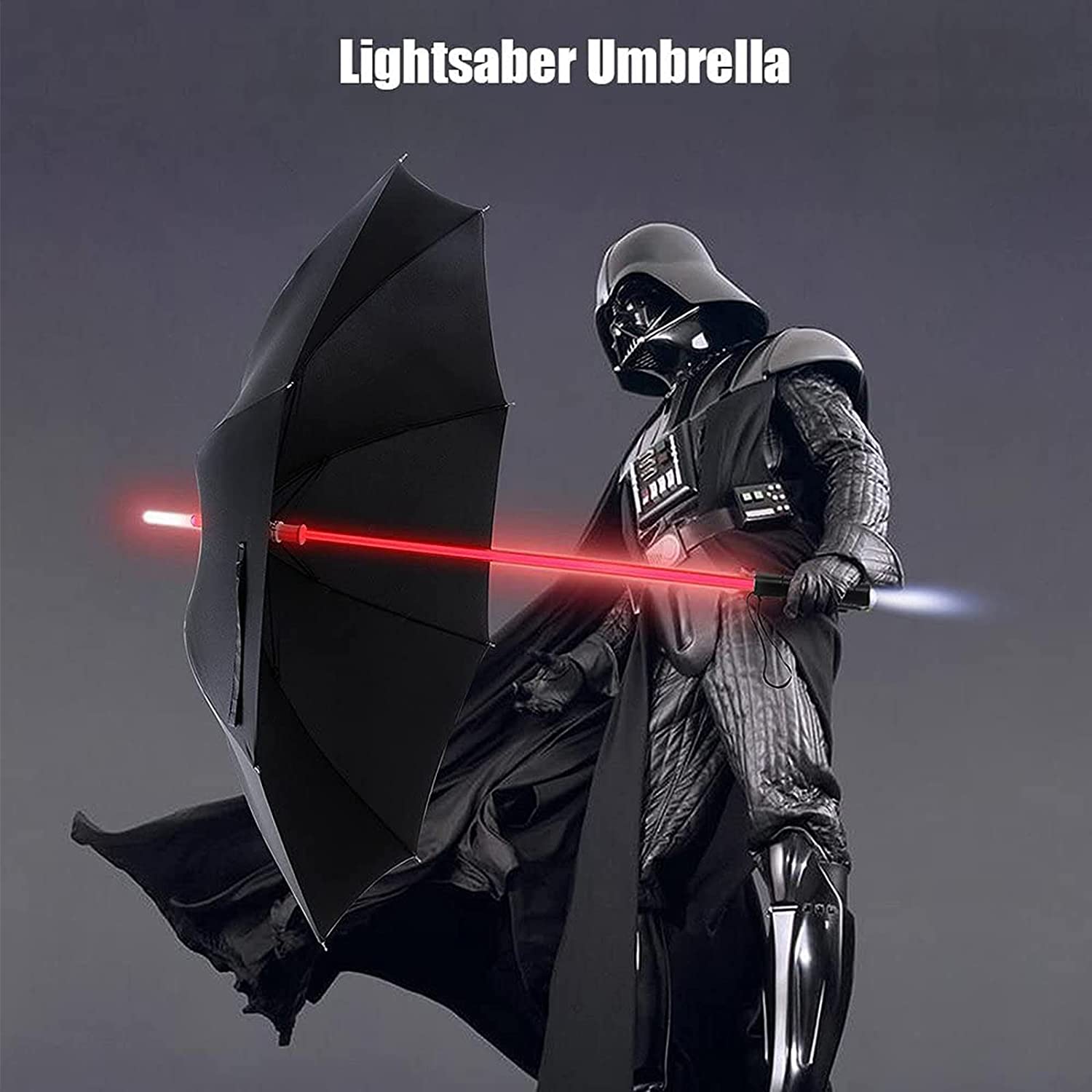 Darth Vader is holding a black umbrella which has a handle shaped like a red lightsaber