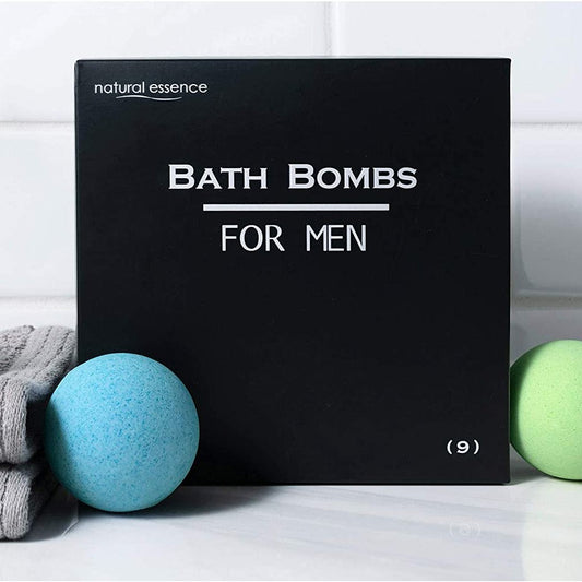 A black box with text that reads, 'Bath bombs for men.' There are blue and green bath bombs resting next to the packaging.