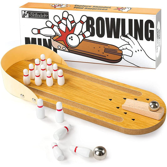 A mini tabletop bowling set out of the box. It includes; wooden board, pins, ramp and two silver bowling balls.