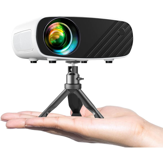 A mini black and white projector on a tripod sitting in the palm of a persons hand.