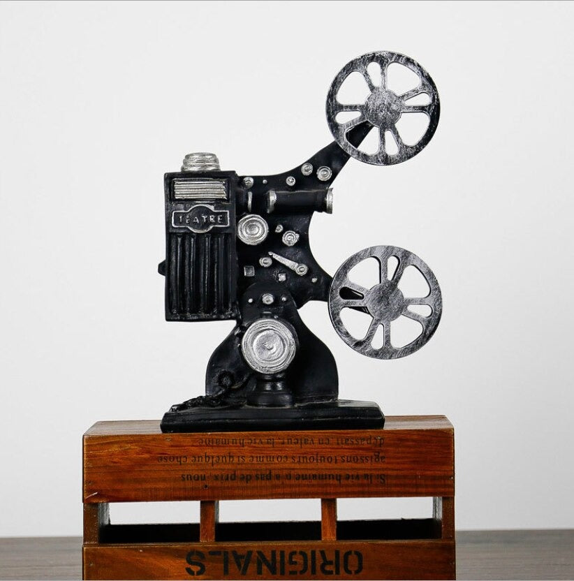 An old school miniature film projector used for model building