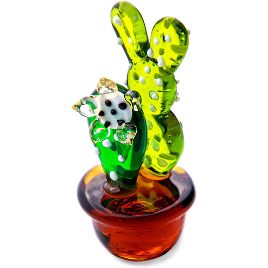 A miniature green glass cactus figurine.