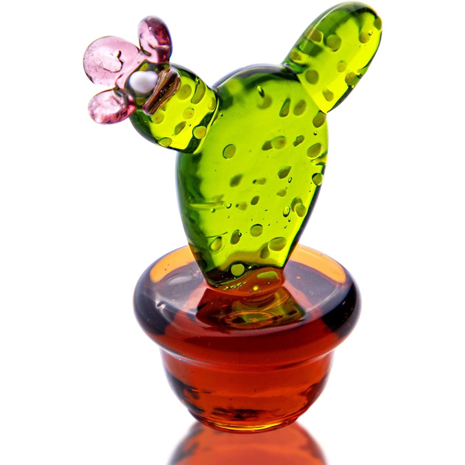 A cute glass cactus figurine colored green with a brown pot.