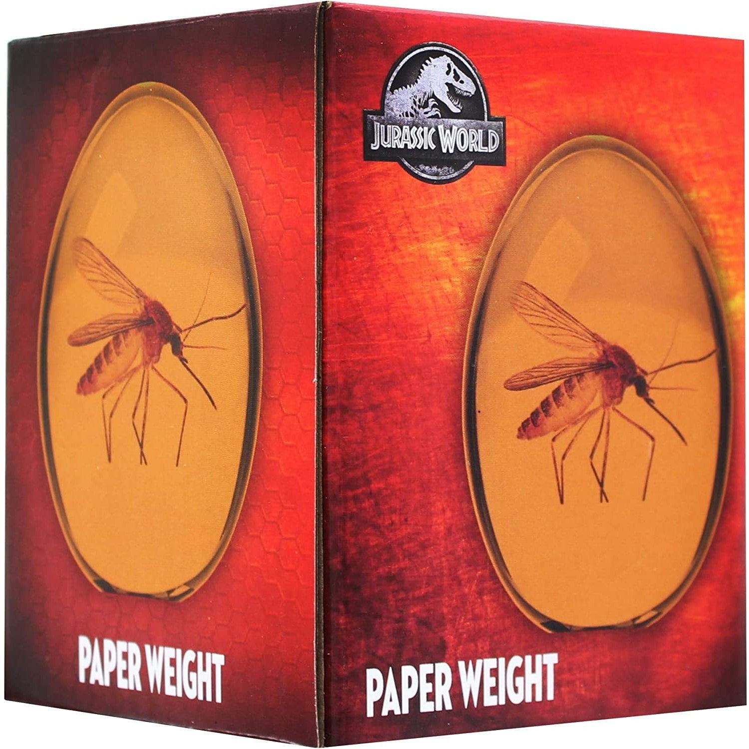The outside packaging box for a mosquito trapped in amber paperweight which is a replica from the one in the Jurassic Park movie. There is text which says. 'Paperweight.'