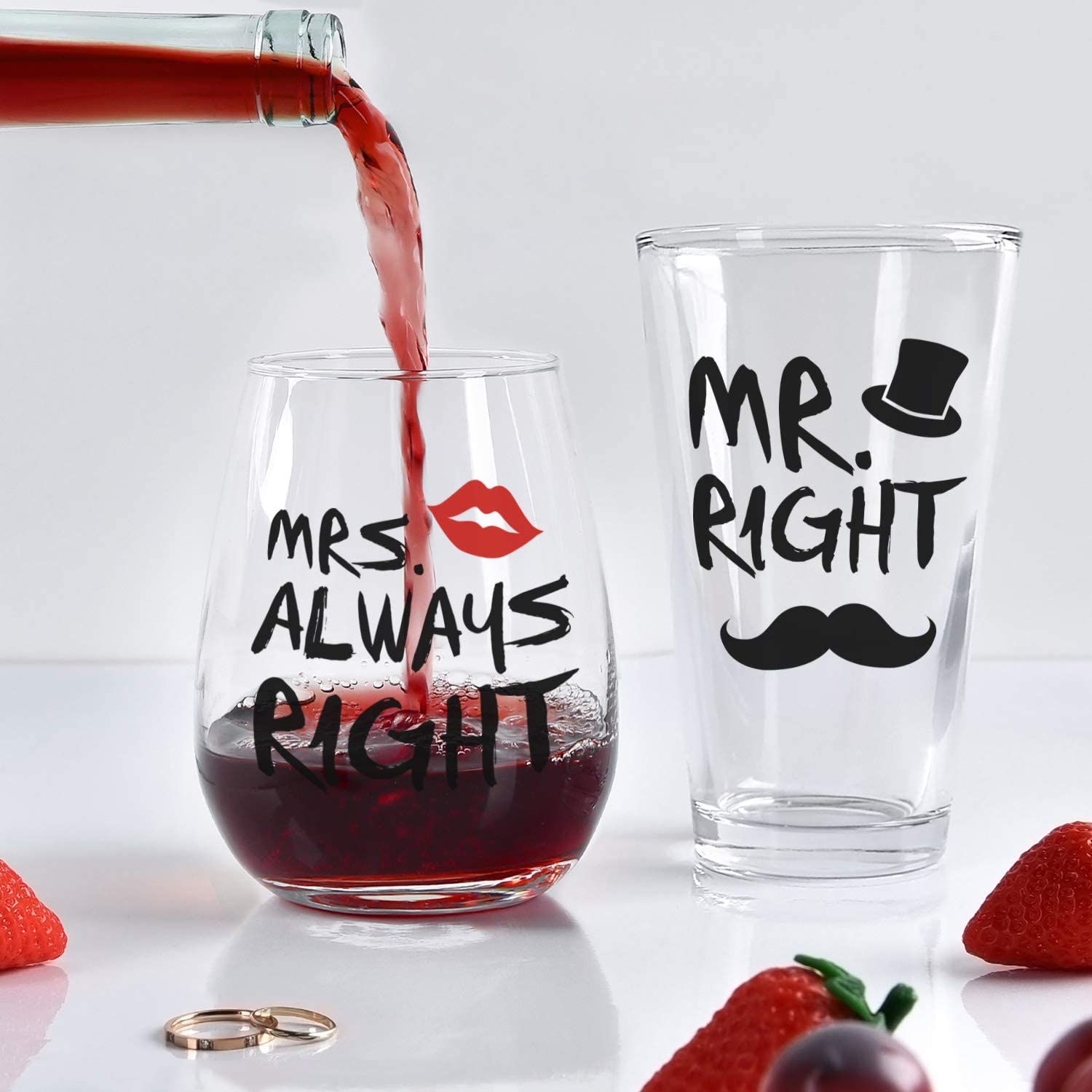 Red wine is being poured into a stemless wine glass which says Mrs Always Right. There is also a Mr Right matching beer glass.