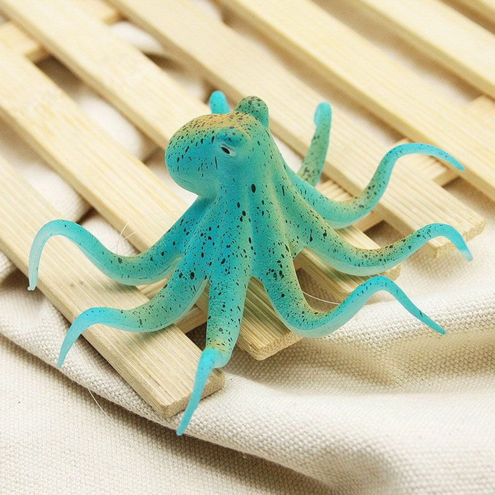 A blue/green fluorescent octopus aquarium decoration used for fish tanks.