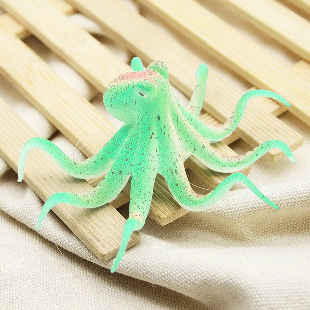 An artifical light green octopus ornament which is used to put in fish tanks.