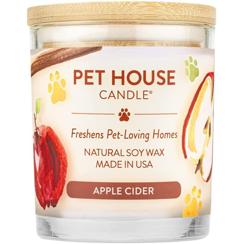Apple cider scented pet order eliminating candle on a white background