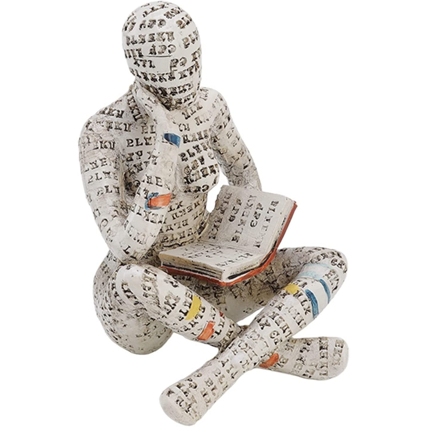 A figurine of a woman sitting with her legs crossed deep in thought reading a book.