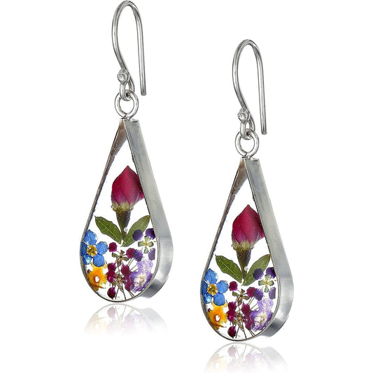 A pair of earrings with real pressed flowers inside.