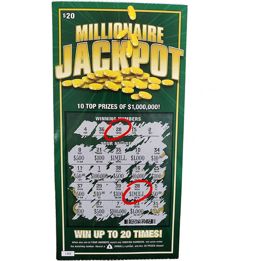 A fake winning lottery scratch-off ticket called Millionaire Jackpot. The ticket has been scratched off and shows a winning of 1 million dollars.