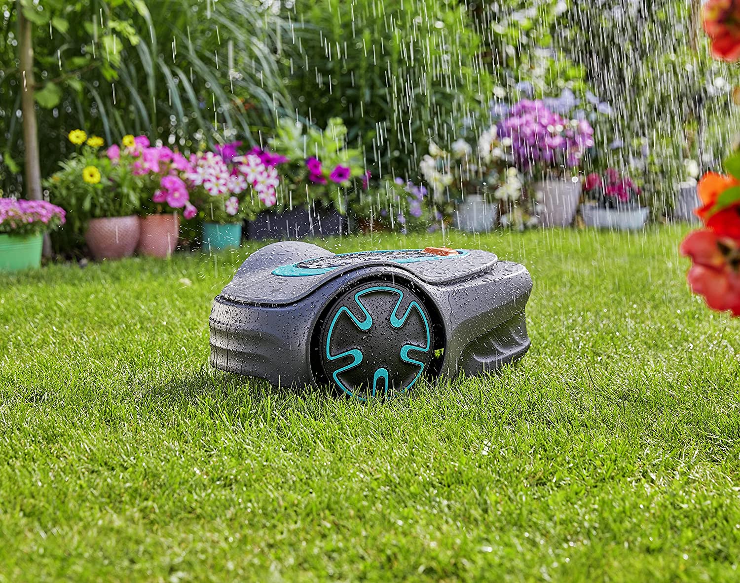 A robotic lawn mover in the rain showing its weatherproof.