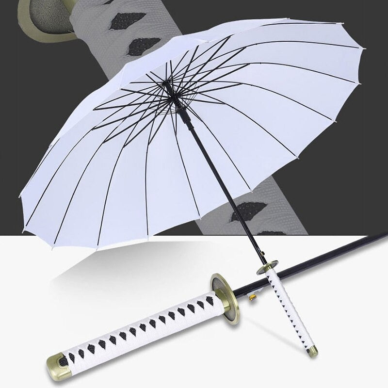 A white colored samurai sword umbrella. There are two images in this picture. One is a closeup of the handle which looks like a samurai sword. The other is of a white samurai sword umbrella opened up.